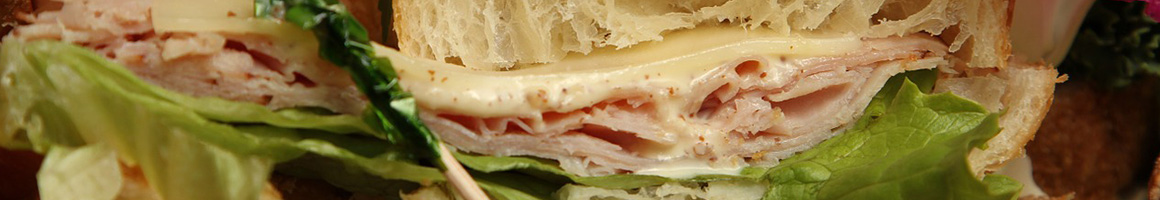 Eating Sandwich at Hofbrau der Albatross restaurant in Morro Bay, CA.
